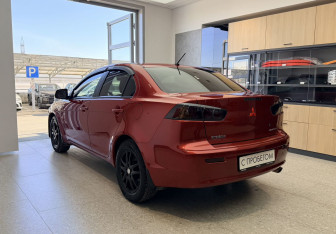 Подержанный автомобиль Mitsubishi Lancer Sedan 2012 года (5 фото)