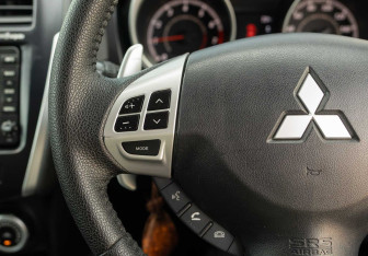 Подержанный автомобиль Mitsubishi RVR Suv 2010 года (12 фото)