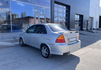 Подержанный автомобиль Suzuki Aerio Sedan 2003 года (7 фото)