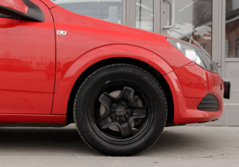 Подержанный автомобиль Opel Astra Hatchback 2010 года (9 фото)