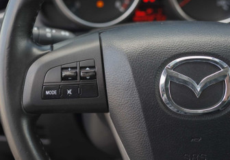 Подержанный автомобиль Mazda 3 Sedan 2009 года (12 фото)