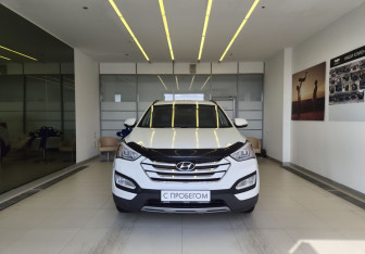 Подержанный автомобиль Hyundai Santa Fe 2015 года (2 фото)